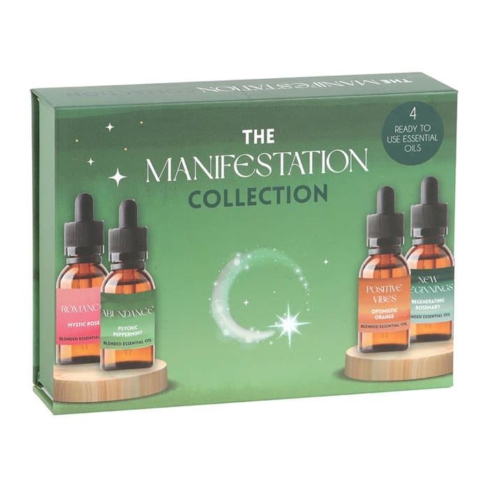 Set of four glass essential oil bottles with dropper lids in a display box