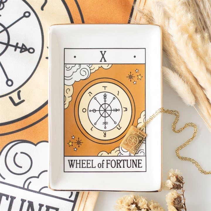 Ceramic tarot trinket dish with a Wheel of Fortune design and gold edging