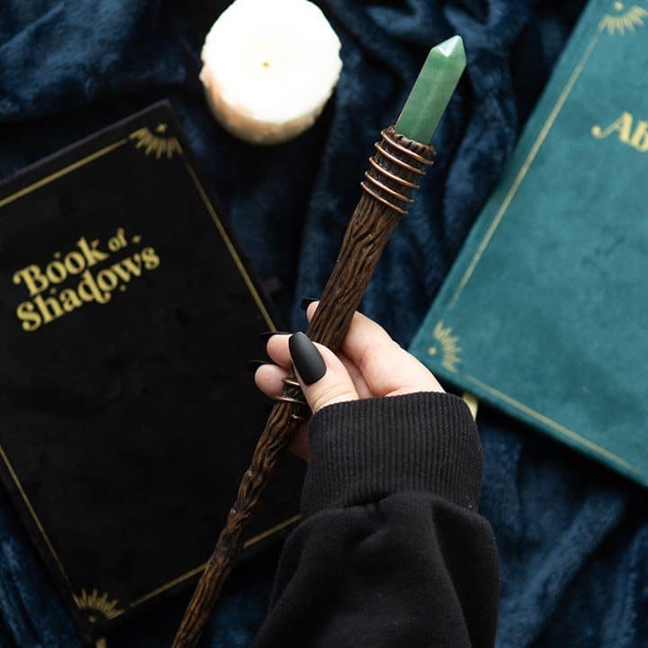 Slim crystal wand with a green aventurine crystal point
