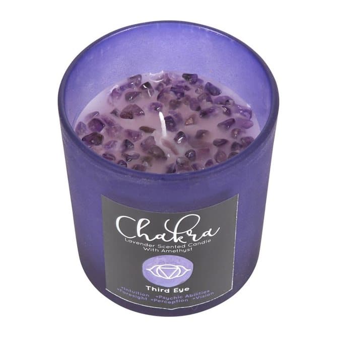 Purple frosted glass candle with amethyst chips and a metallic lid