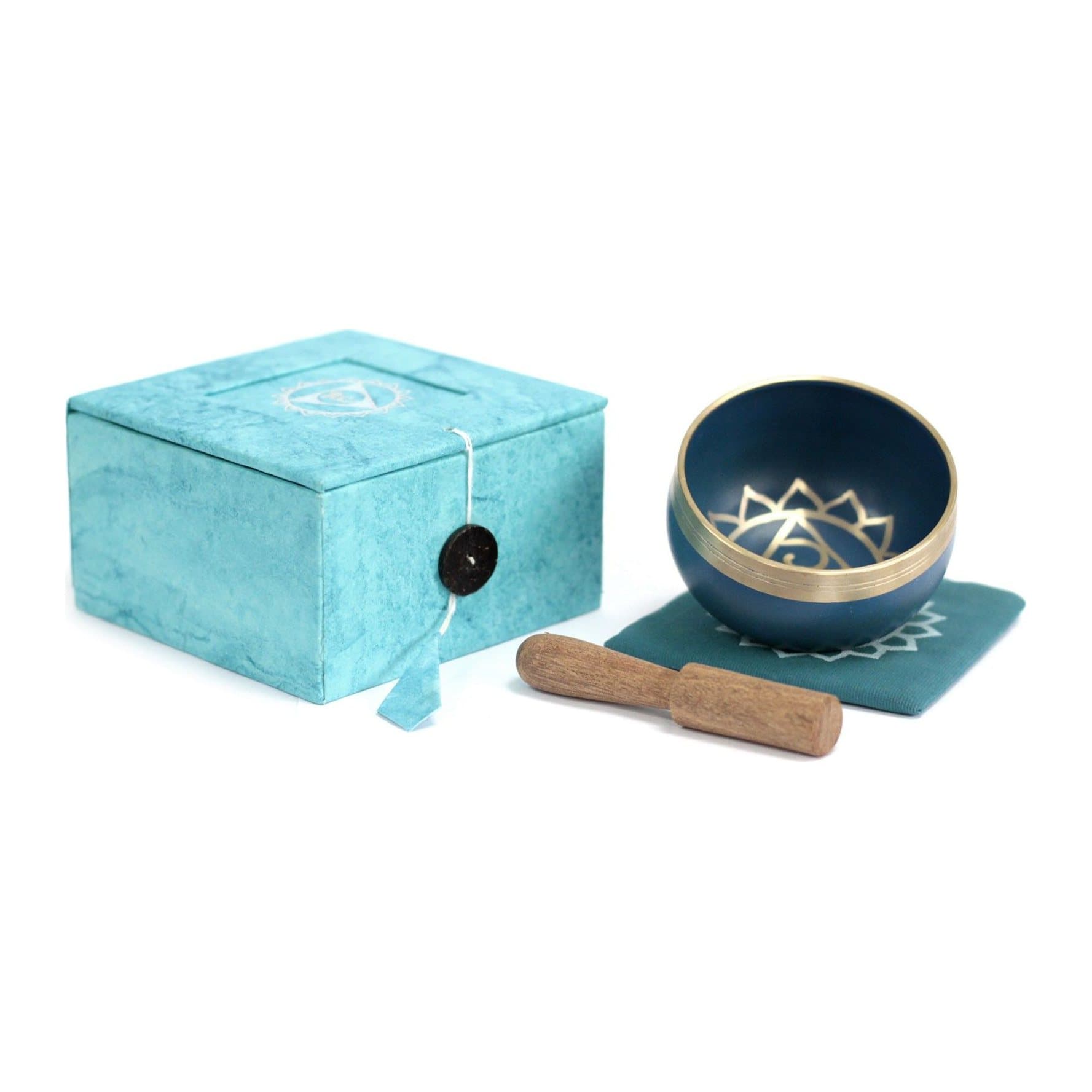 Small brass throat chakra singing bowl with a wooden stick
