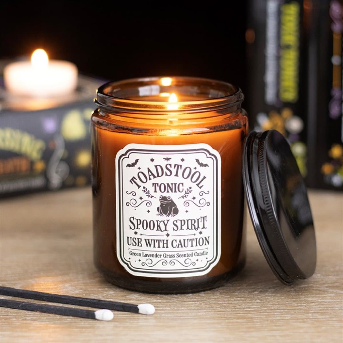 Toadstool Tonic scented candle in an apothecary-style glass jar
