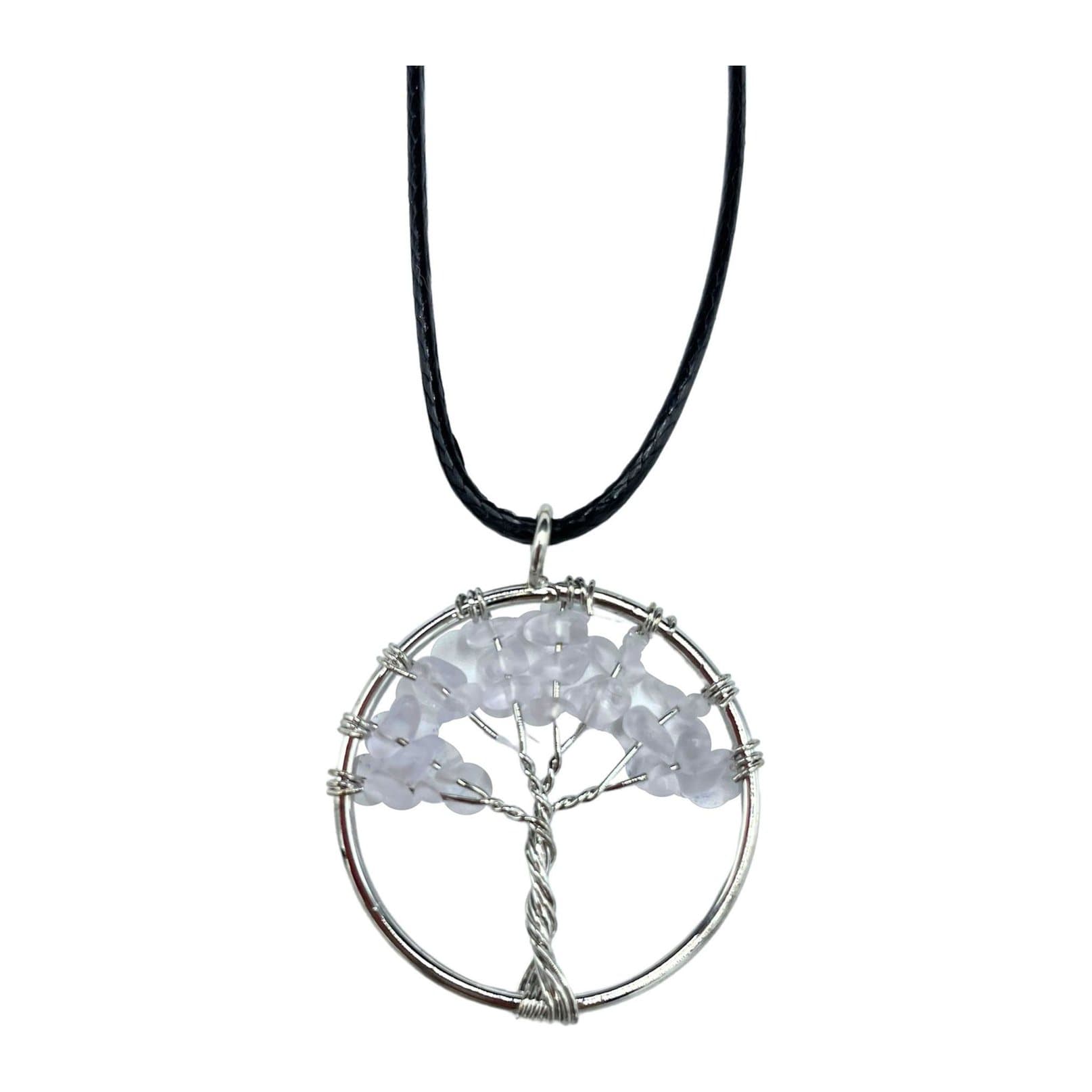 Tree of Life pendant with branches around a clear rock crystal gemstone