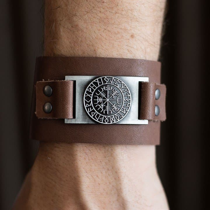 Brown leather cuff bracelet with a Vegvisir Viking compass symbol