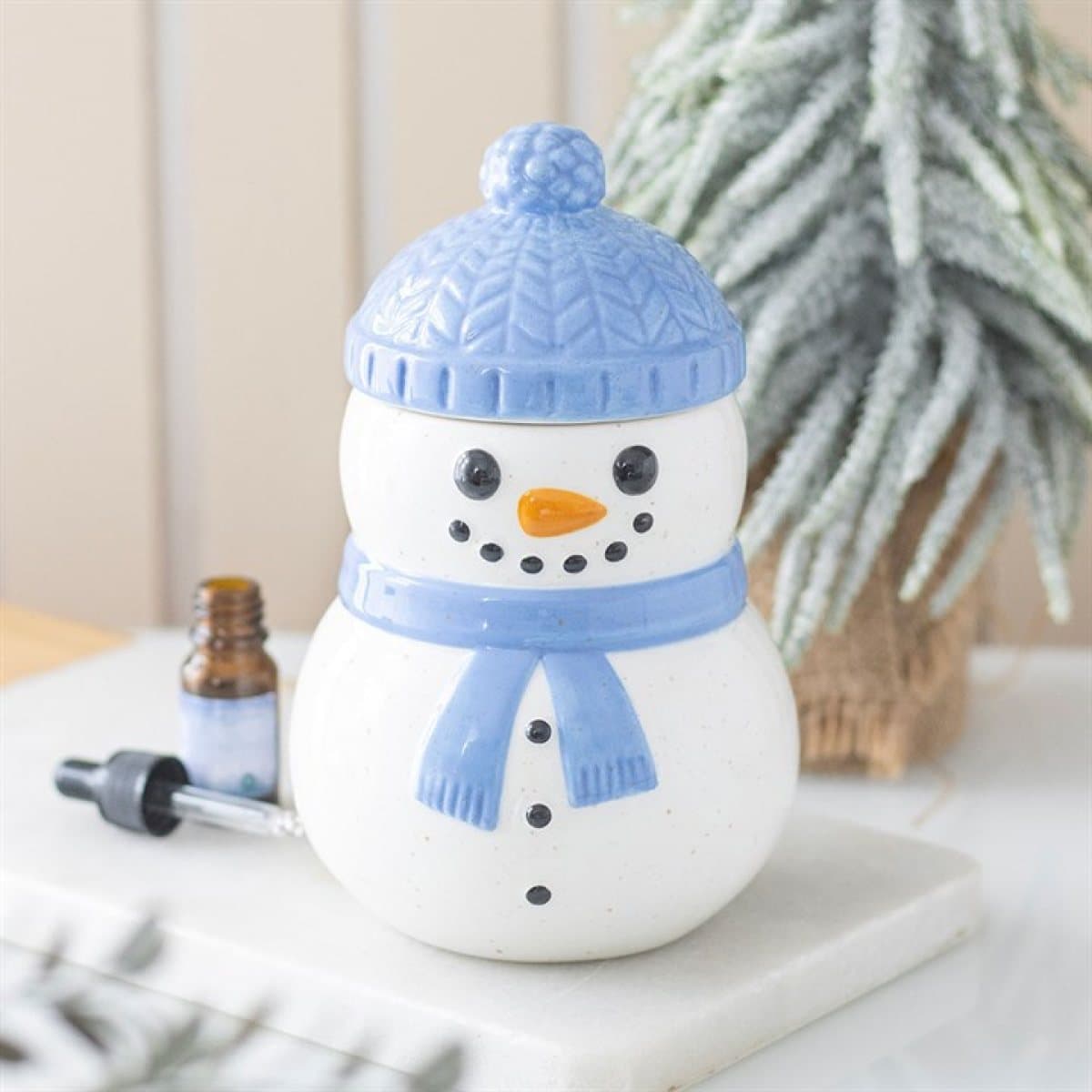 Blue ceramic winter snowman oil burner