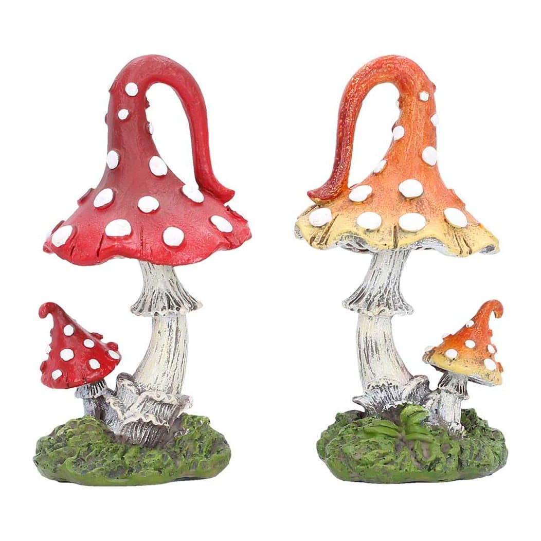 Pair of colourful fantasy mushroom sculptures on grassy bases