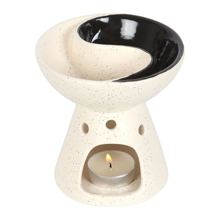 Ceramic oil burner and wax warmer with a split yin and yang dish
