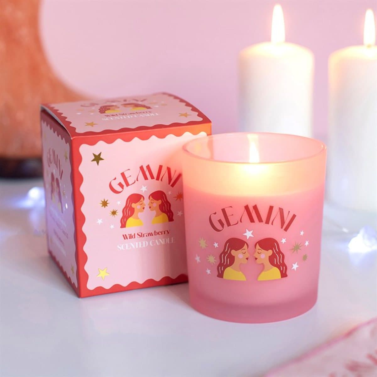 Gemini zodiac candle with a colourful design in a colour cardboard box