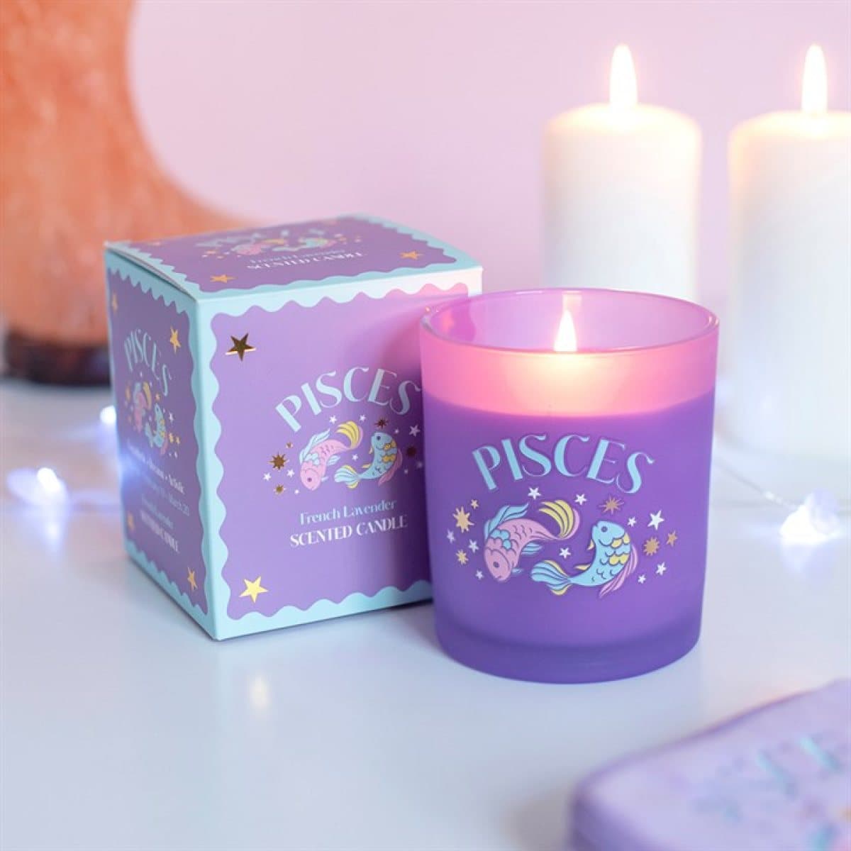 Pisces zodiac candle with a colourful design inspired by the sign of the fish