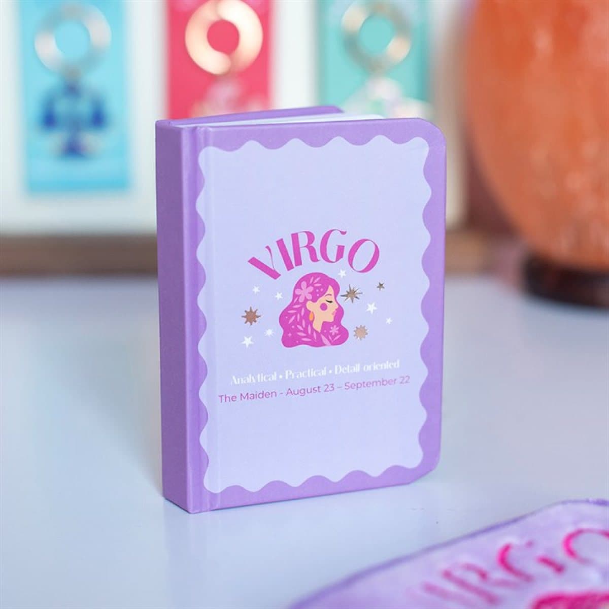 Mini A7 Virgo notebook with colourful maiden-inspired artwork
